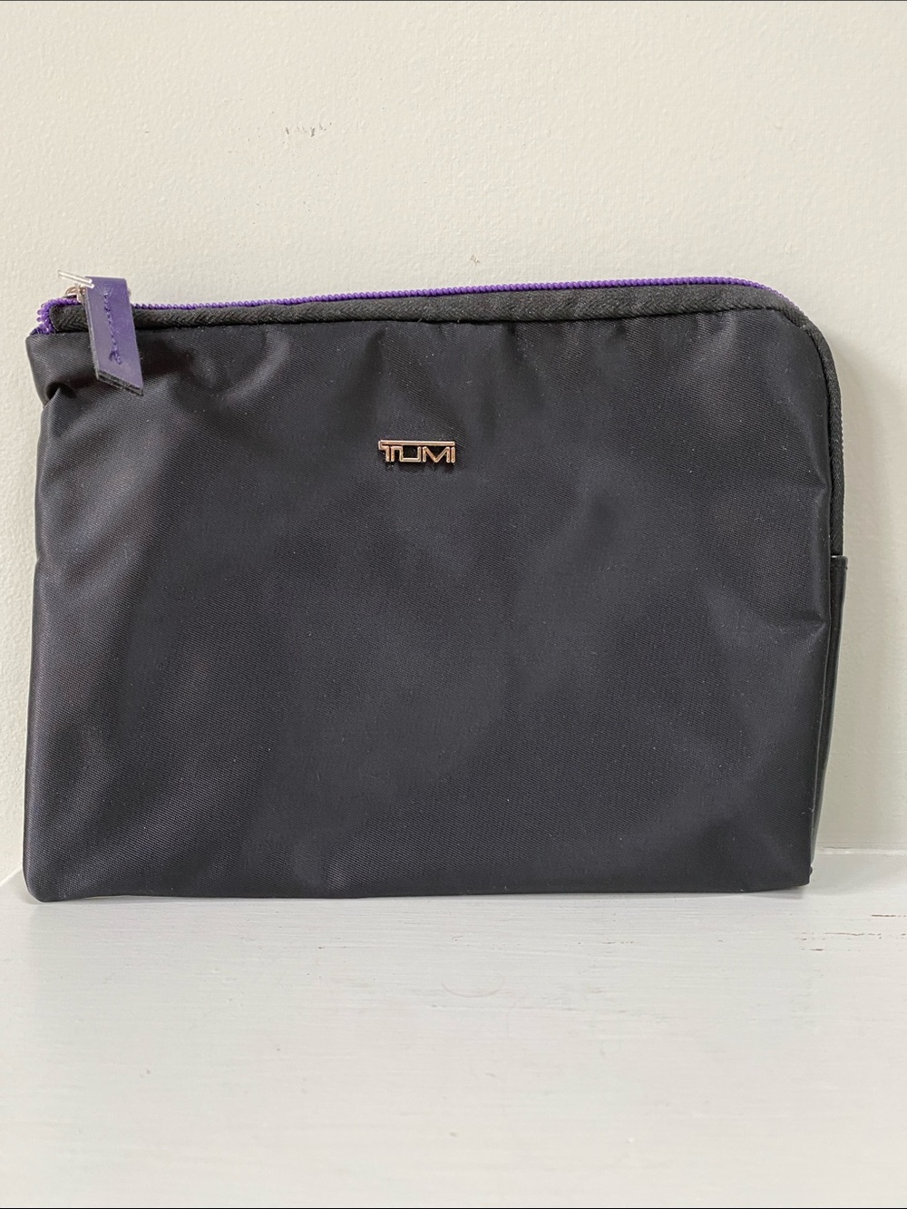 Tumi Black Toiletry Pouch with Purple Zip Trim